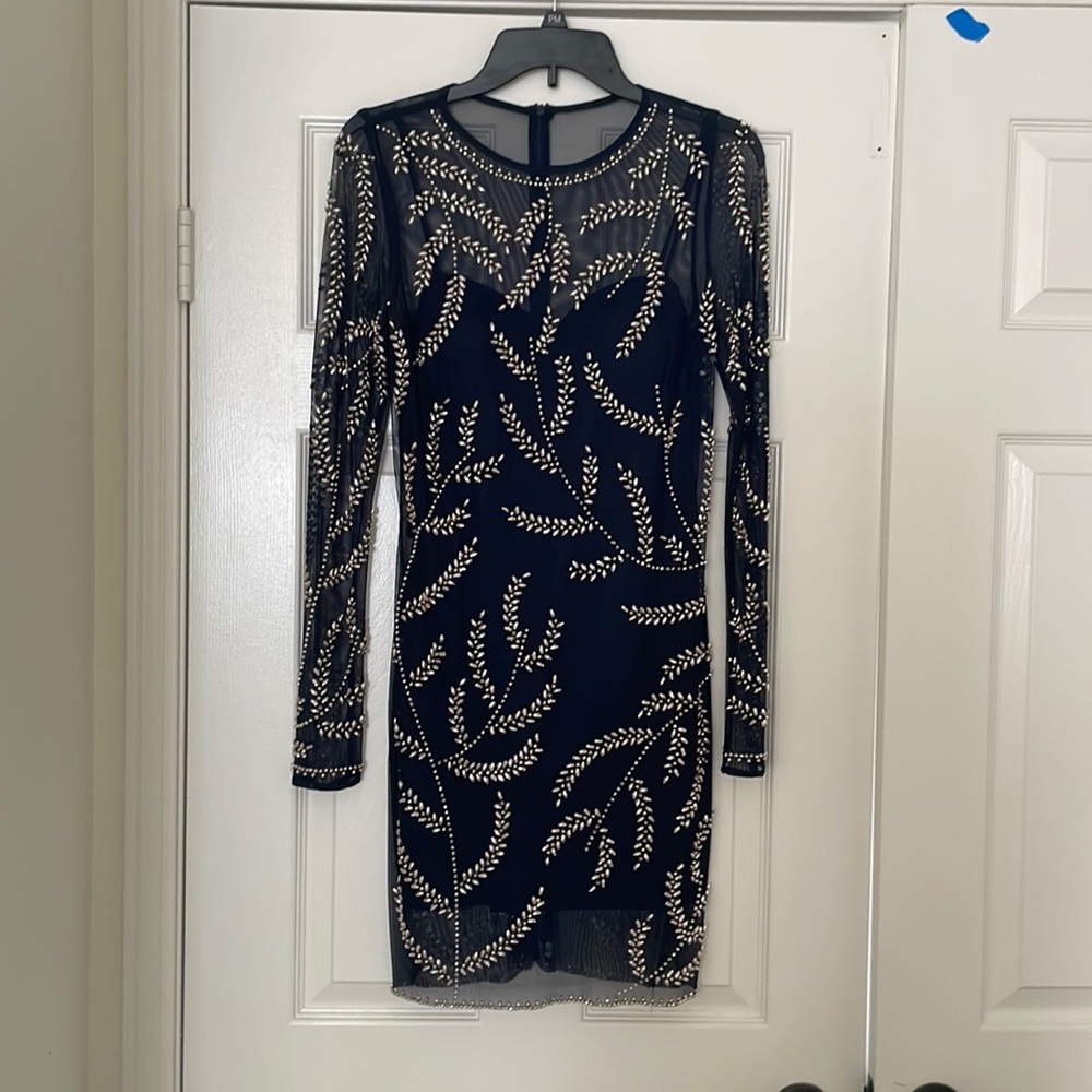 Women’s formal knee length beaded dress